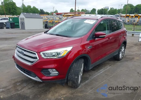 2017 Ford Escape Titanium z USA, uszkodzony, nr VIN 1FMCU0J97HUE84151